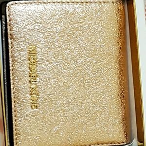 Small fold over Michael kors wallet